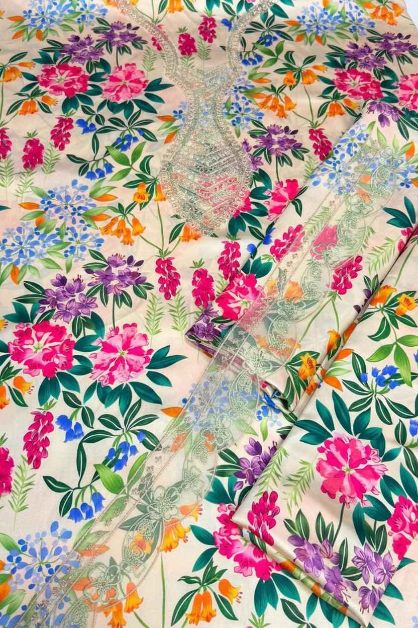 Embroidered silk suit in smooth fabric with elegant detailing.